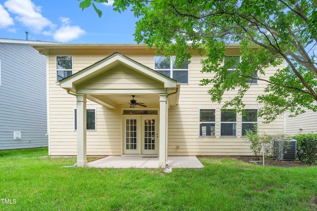 532 Front Ridge Dr, Cary, NC 27519 - back of property with ceiling fan, a lawn, a patio, and central AC