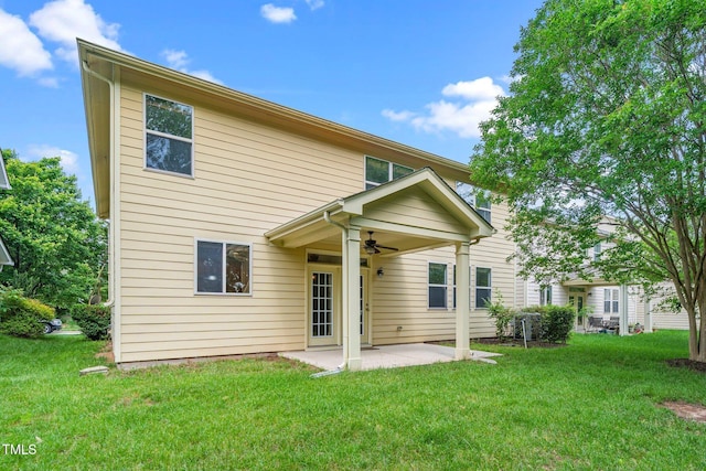532 Front Ridge Dr, Cary, NC 27519 - back of house featuring ceiling fan, a patio area, and a yard