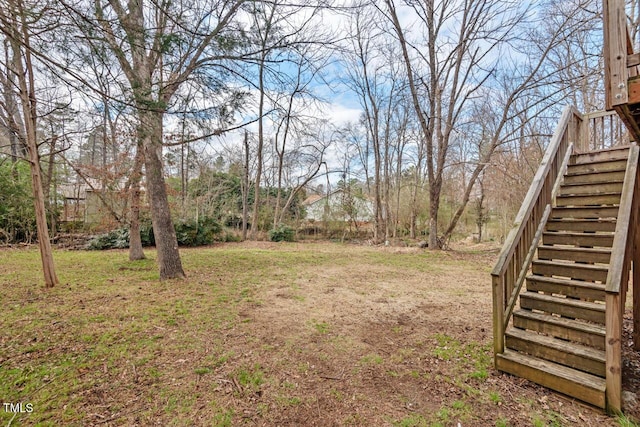 view of yard featuring stairway