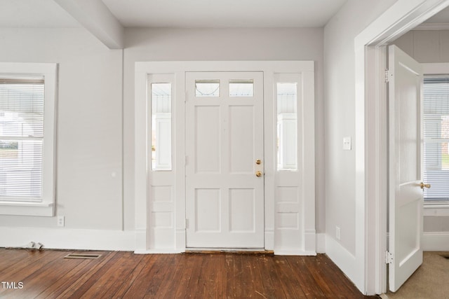 entryway featuring dark wood-type flooring