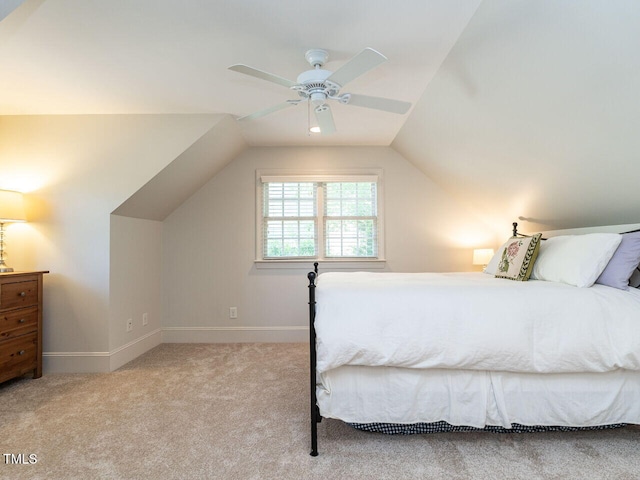 3504 Rock Creek Dr, Raleigh, NC 27609 - carpeted bedroom with baseboards, ceiling fan, and lofted ceiling