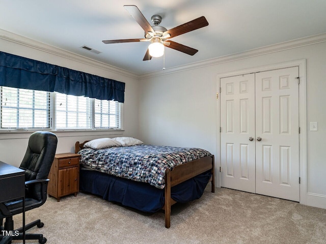 3504 Rock Creek Dr, Raleigh, NC 27609 - bedroom featuring crown molding, a closet, light colored carpet, and visible vents