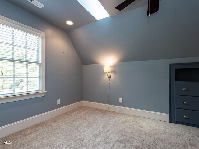 3504 Rock Creek Dr, Raleigh, NC 27609 - additional living space with carpet, a ceiling fan, baseboards, vaulted ceiling, and visible vents