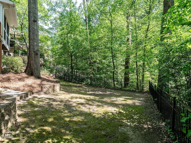 3504 Rock Creek Dr, Raleigh, NC 27609 - view of yard featuring fence and a forest view