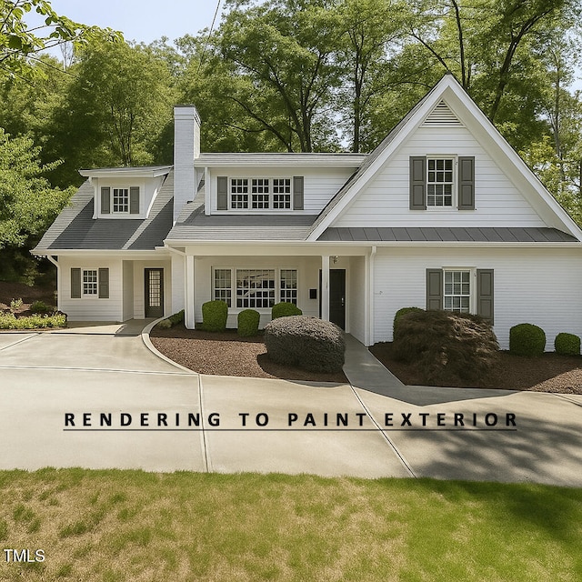 3504 Rock Creek Dr, Raleigh, NC 27609 - view of front of home featuring a chimney, a metal roof, and a standing seam roof