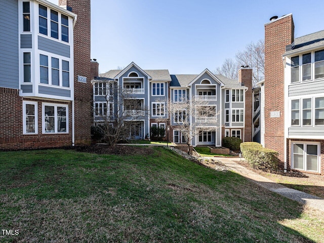 exterior space featuring a front lawn