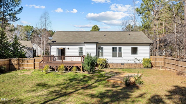 back of house featuring a deck, crawl space, a fenced backyard, and a lawn