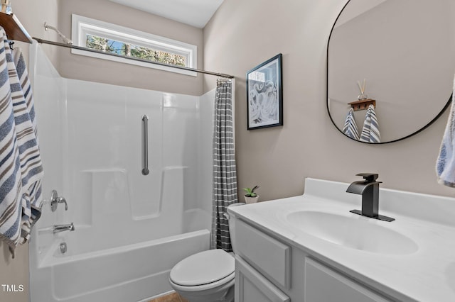 bathroom with vanity, toilet, and shower / tub combo with curtain