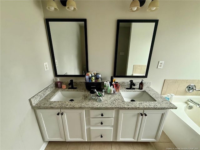 bathroom with vanity and a bathing tub