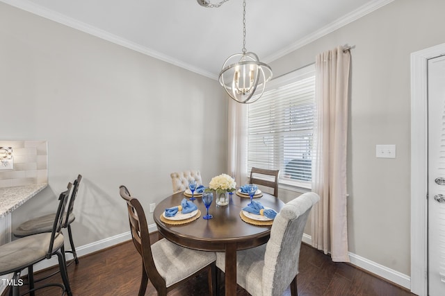 dining area with dark wood-style floors, ornamental molding, baseboards, and an inviting chandelier