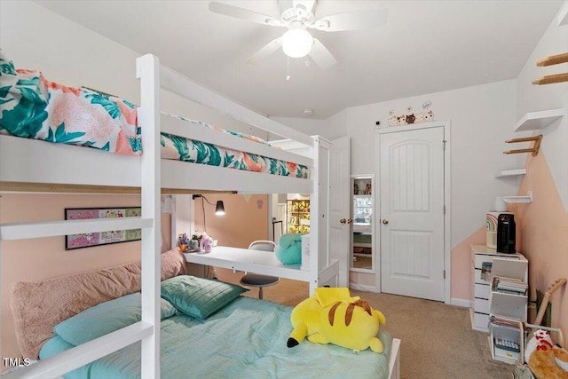 carpeted bedroom featuring ceiling fan