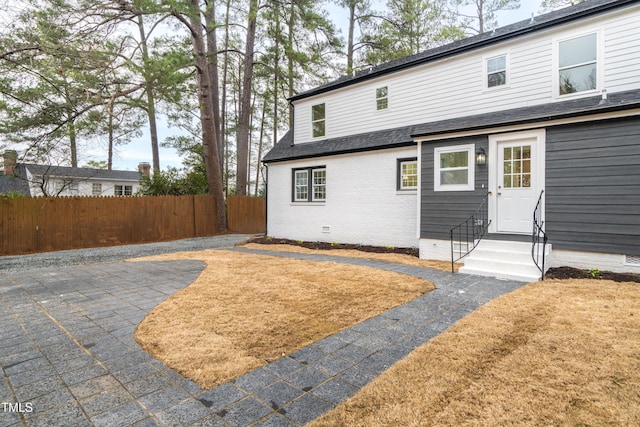 back of house featuring a patio area