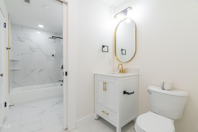 full bathroom with vanity, toilet, and tiled shower / bath