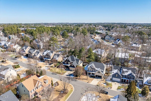 birds eye view of property with a residential view