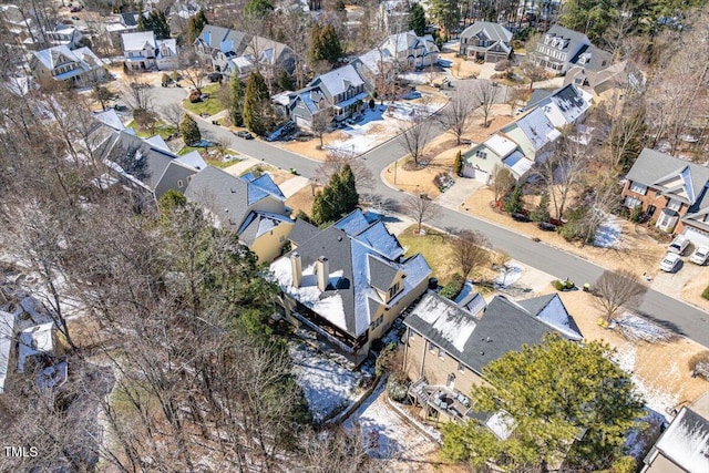 birds eye view of property with a residential view