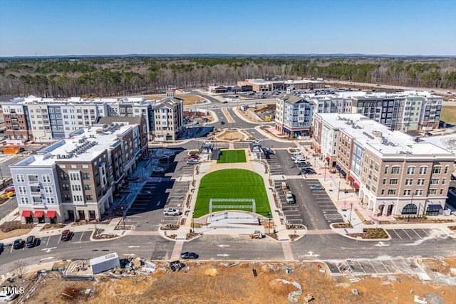 birds eye view of property with a view of city