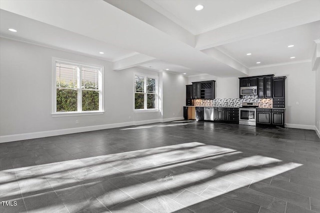 living room with recessed lighting, baseboards, and ornamental molding