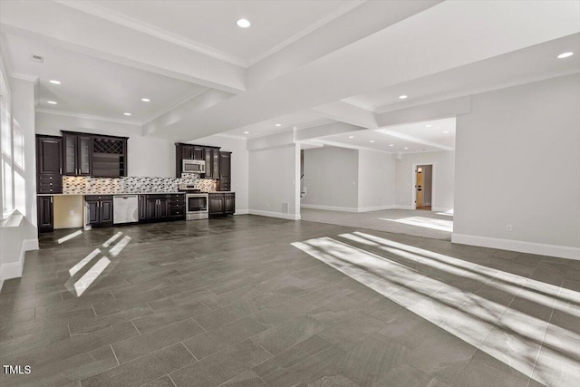 unfurnished living room with baseboards, beamed ceiling, crown molding, indoor wet bar, and recessed lighting