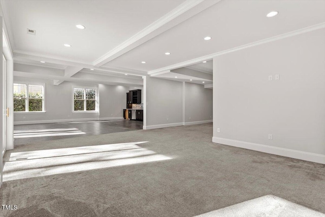 spare room featuring baseboards, visible vents, ornamental molding, beamed ceiling, and recessed lighting