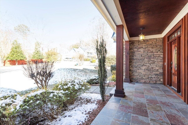 view of snow covered patio