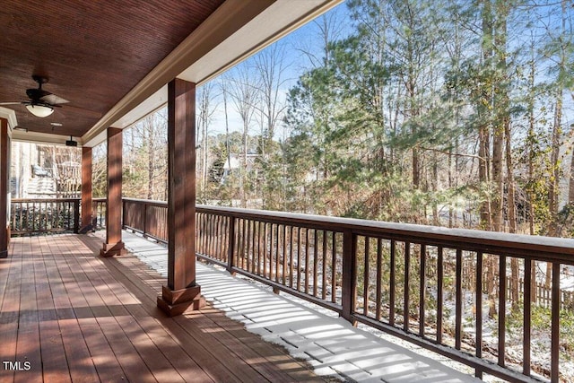 wooden deck with ceiling fan