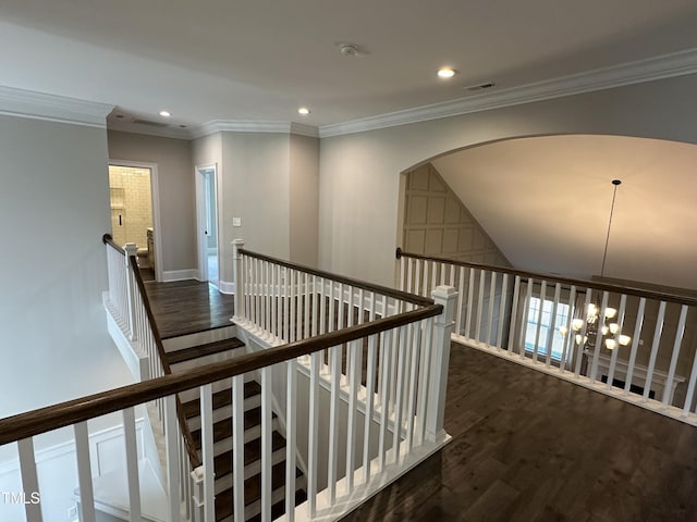 hallway featuring recessed lighting, an upstairs landing, visible vents, dark wood-style floors, and crown molding