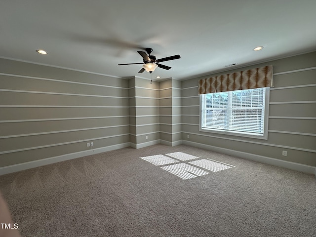 carpeted spare room with baseboards, visible vents, and recessed lighting