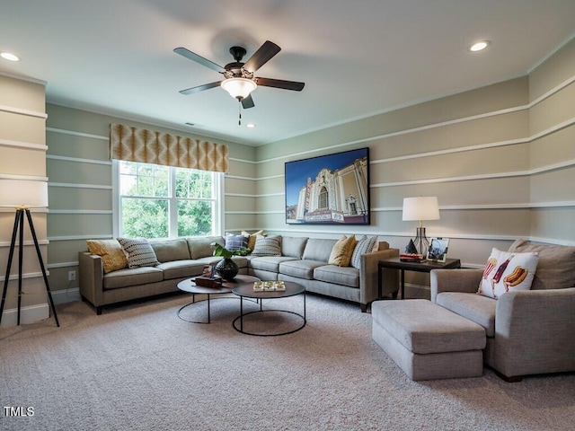 carpeted living room with a ceiling fan and recessed lighting