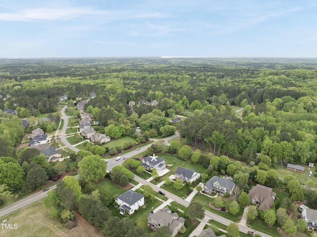 aerial view featuring a residential view and a forest view