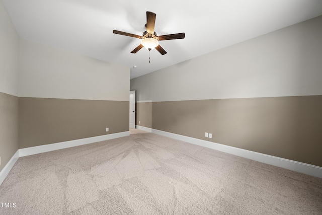 additional living space featuring ceiling fan, baseboards, and light carpet