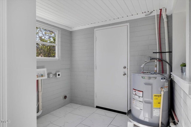 laundry area with hookup for an electric dryer, electric water heater, and washer hookup