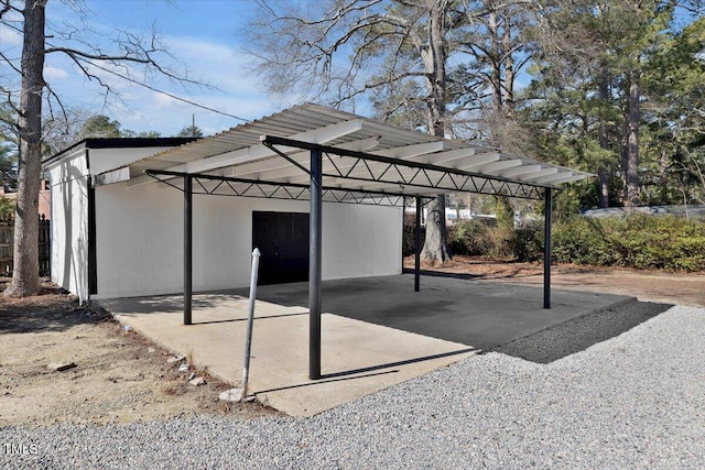 view of patio / terrace with a carport