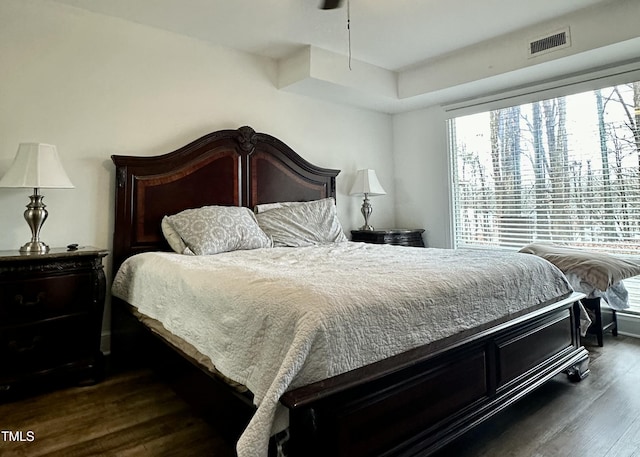 bedroom featuring dark hardwood / wood-style floors