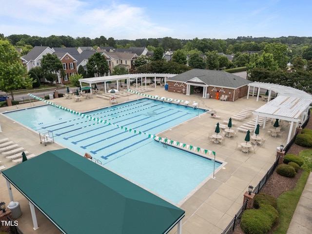 1400 Gathering Park Cir Unit 202, Cary, NC 27519 - community pool featuring a pergola, a patio area, and a residential view