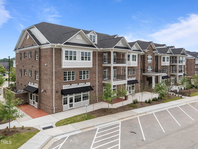 1400 Gathering Park Cir Unit 202, Cary, NC 27519 - view of building exterior with uncovered parking