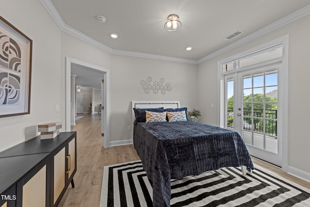 1400 Gathering Park Cir Unit 202, Cary, NC 27519 - bedroom featuring ornamental molding, access to exterior, light wood-style floors, and recessed lighting
