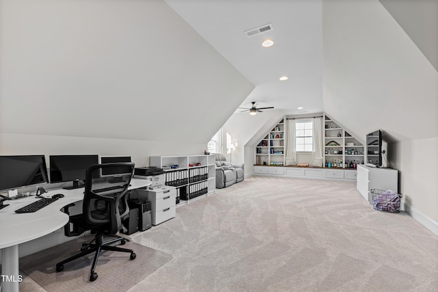 office with visible vents, built in features, baseboards, lofted ceiling, and carpet floors