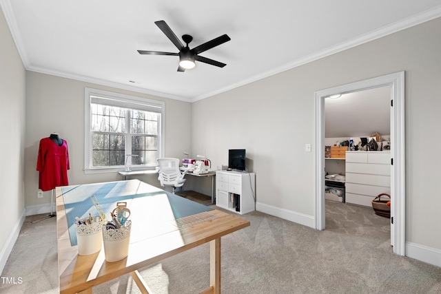 office space with crown molding, visible vents, light carpet, ceiling fan, and baseboards