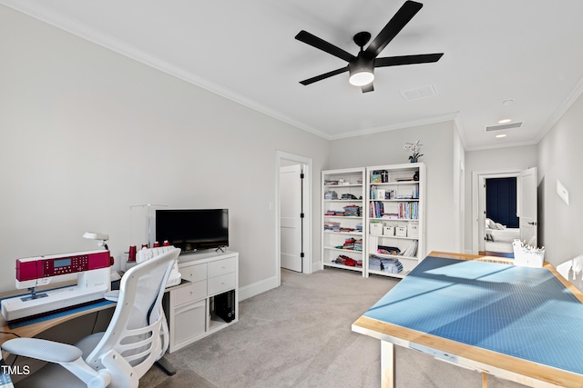 office area with ornamental molding, carpet flooring, a ceiling fan, and baseboards