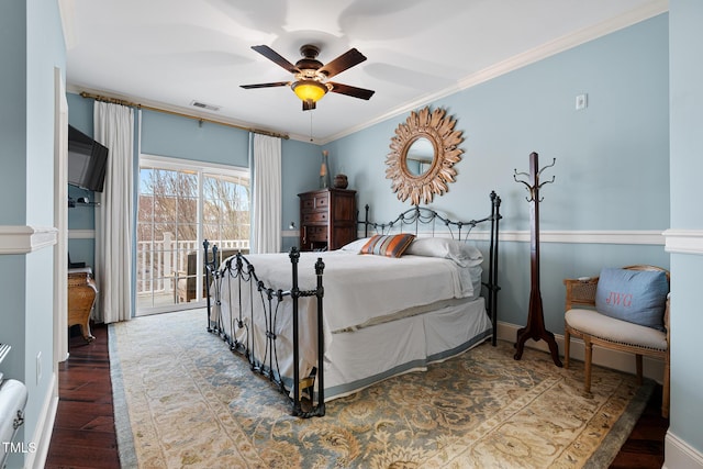 bedroom with hardwood / wood-style floors, access to outside, ornamental molding, and ceiling fan