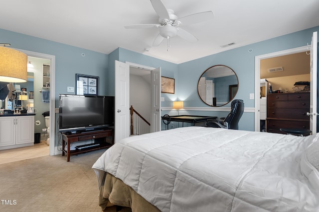 carpeted bedroom featuring ceiling fan