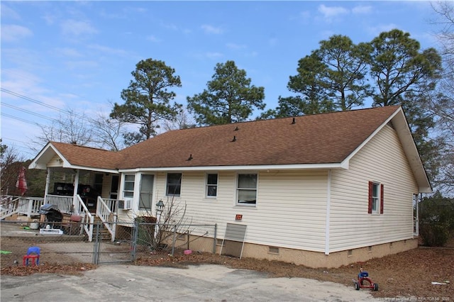 back of property with a porch and cooling unit