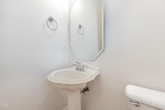 bathroom featuring toilet