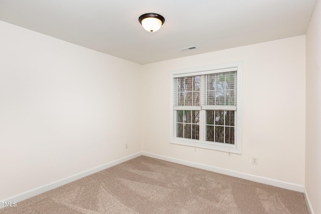 empty room featuring carpet