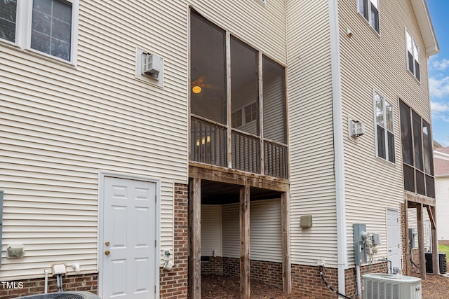 exterior space featuring a balcony and central air condition unit