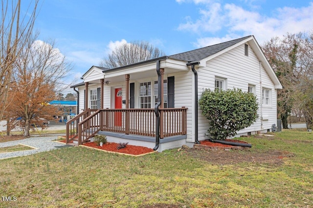 view of front of house with a front lawn and covered porch