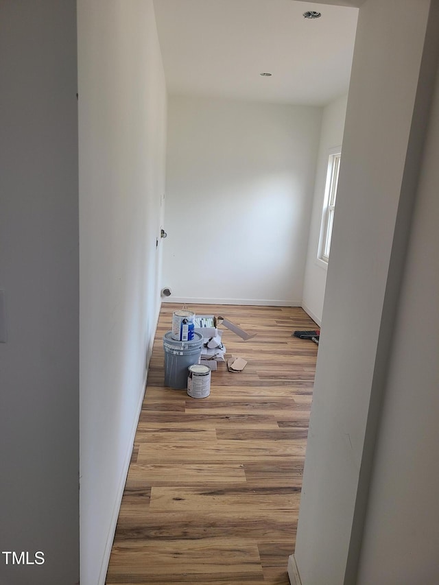 unfurnished room with hardwood / wood-style floors