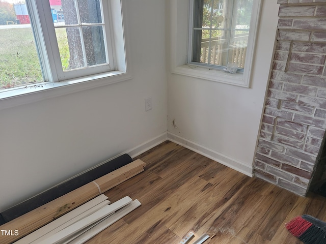 empty room featuring dark hardwood / wood-style flooring