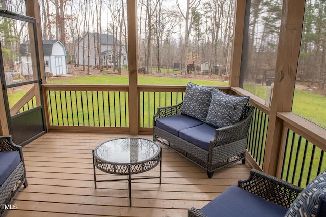 deck with a yard and an outdoor living space