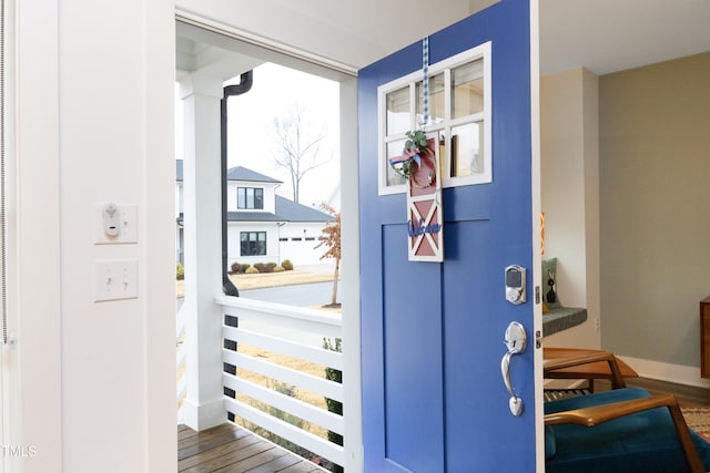 doorway to outside featuring hardwood / wood-style floors